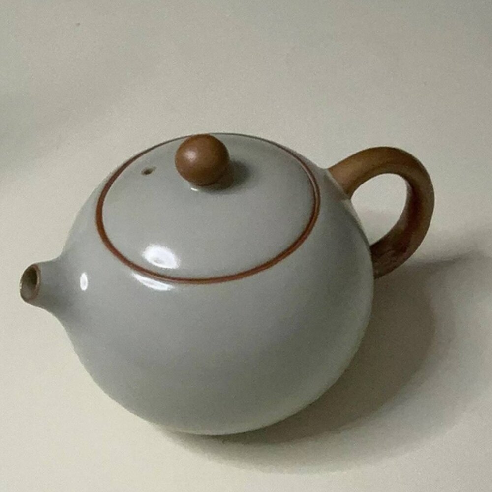 Elegant Neutral Ceramic Teapot for Tea Time